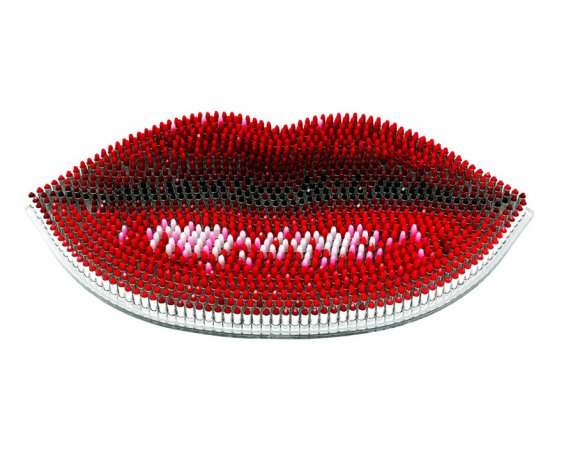 Lips, 2011. Imitation lipsticks in resin on perspex. 112 x 57cm.